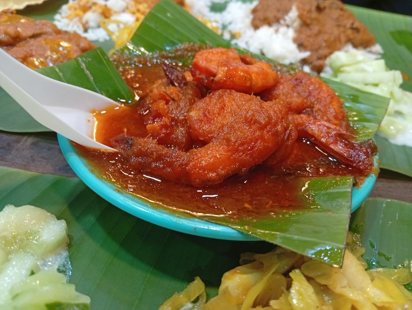 Prawn curry on banana leaf